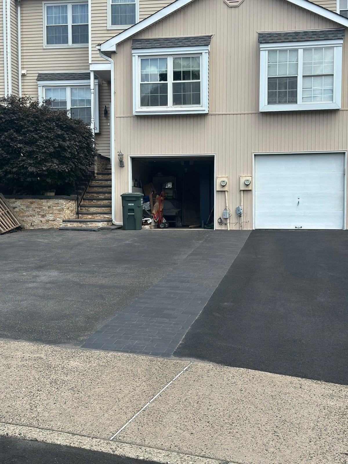 Driveway Divider Reconstruction with Concrete Pavers — after